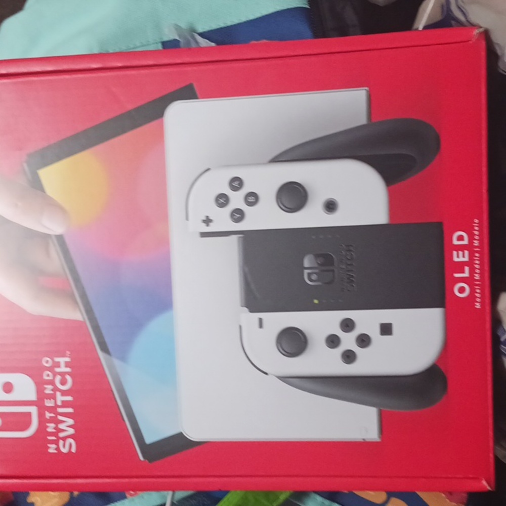 Nintendo switch OLED 340$ BRAND NEW USED ONCE
